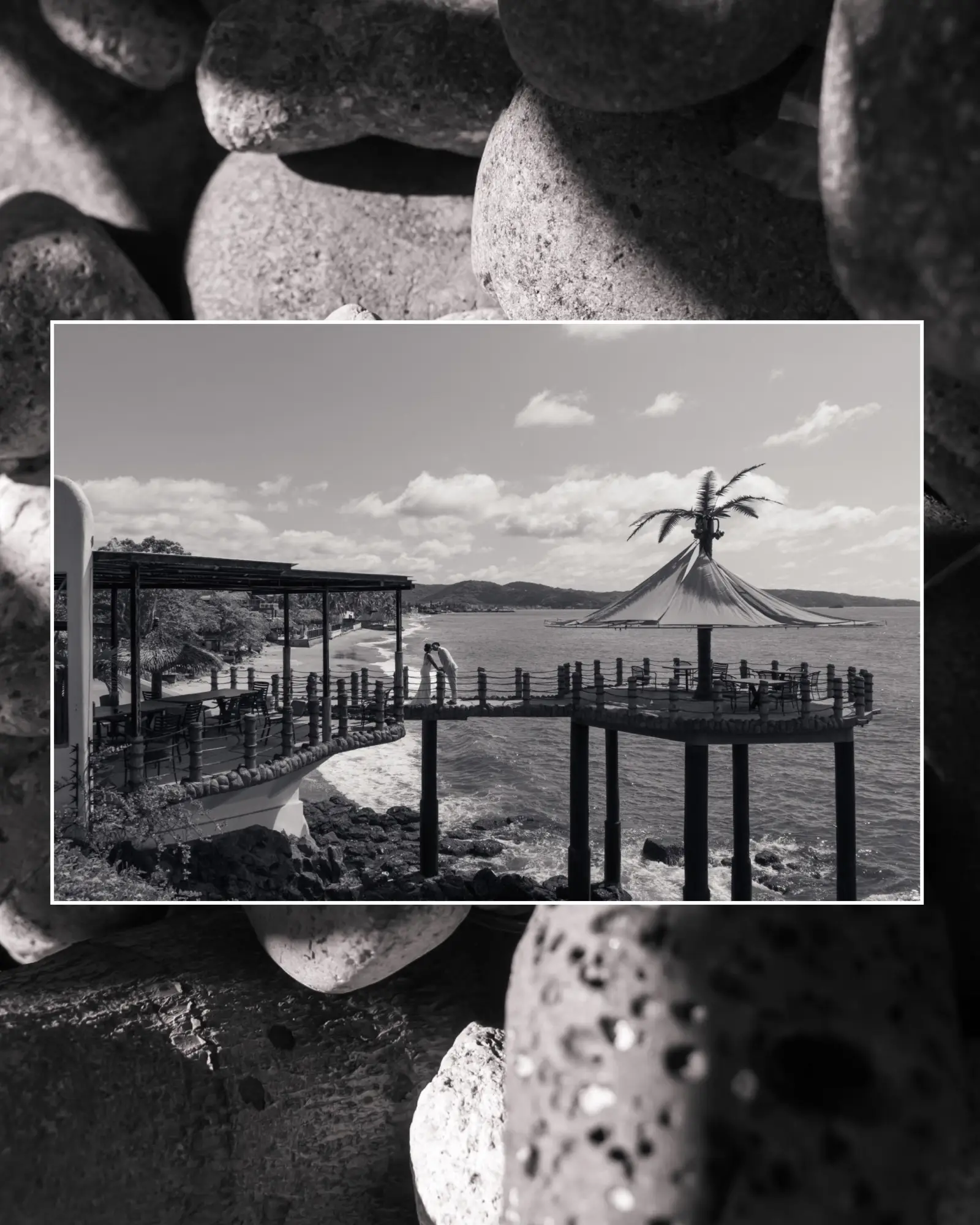 Couple on the oceanfront platform at La Puesta del Sol